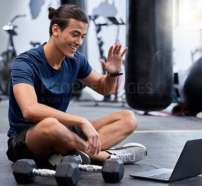 Buy stock photo Man, laptop and wave for video call in gym with smile rest on floor after training session. Guy, wellness and pc break during workout for fitness, health or sport with happiness on online webinar
