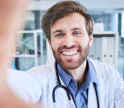 Buy stock photo Healthcare, selfie and doctor with smile in hospital office, happy health care employee or pharmacist. Happiness, medicine and medical worker in clinic taking profile picture for social media website