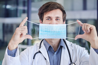 Buy stock photo Healthcare, face mask and portrait of doctor in a hospital standing in the lobby after a consultation. Covid regulations, pandemic and surgeon with mask working in medicare clinic or center in Canada