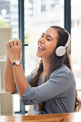 Buy stock photo Woman, singing and listening to music with smile for streaming, entertainment and headphones at the office. Happy female smiling for audio track, sing and sound for fun, hifi and chilling at work
