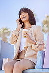 Phone call, coffee and black woman outdoor with shopping bag, conversation and sale. Female, girl and customer with expensive clothes, boutique items and tea in city, talking and relax with discount.