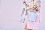 Woman, shopping bag and mockup on pink background for advertising retail discount, product sales and store promotion. Closeup female customer, marketing space and luxury fashion brand, offer and deal