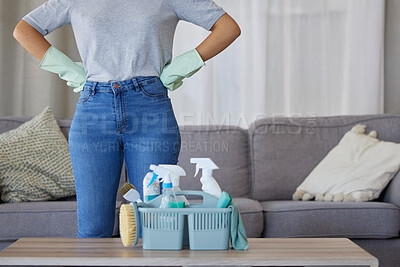 Buy stock photo Closeup of woman, cleaning and basket with product in living room, lounge and home of housekeeping, maintenance or disinfection. Cleaner, maid and ready for cleaning services with detergent container