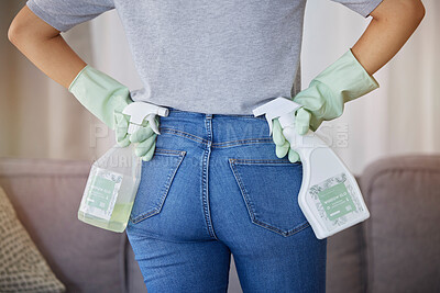 Buy stock photo Cleaning, housework and woman from back with spray bottle and gloves in in living room at home. Spring cleaning, hygiene and bottle of soap or sanitizer to clean dirty sofa, housekeeper in apartment.