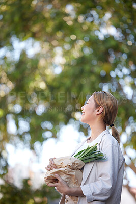 Buy stock photo Woman, customer and grocery shopping with vegetables for natural eco friendly bag on mockup. Asian female shopper smiling holding healthy food for diet or green products for nutrition in nature