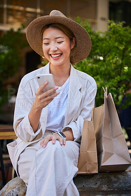 Buy stock photo Shopping, city and woman in Japan with smartphone for ecommerce website, fintech and internet deal on sales, product promotion and discount. Cellphone, asian or Japanese girl and shopping bag at mall