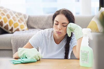 Buy stock photo Tired woman, cleaning and burnout with cloth, detergent and latex gloves for housework or hygiene at home. Exhausted female domestic relaxing by table on a break from  housekeeping or sanitary work