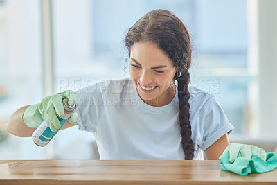 Buy stock photo Cleaning, table and happy woman spray with cloth for dirt, dust or bacteria on furniture at home. Happy cleaner, housekeeping and maid wipe wood surface, maintenance care and spring cleaning services