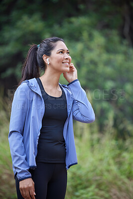 Buy stock photo Fitness, wellness and woman in forest with earphones listening to music, audio and radio for workout. Sports, healthy lifestyle and girl in outdoor park for marathon training, running and exercise