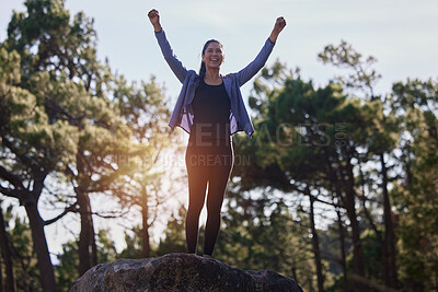 Buy stock photo Hiking, winning and woman celebrating on a rock in a forest for fitness, sport hike in nature with joy. Celebration, success and female athlete hiker with carefree freedom for workout in the woods