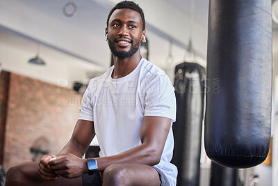 Buy stock photo Black man, fitness and wellness training gym break of an athlete ready for sport exercise. Workout, sports and relax man after boxing and strong bodybuilder set with a smile in a health club