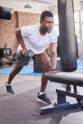 Buy stock photo Gym, black man and dumbbell training, rowing exercise and healthy workout in fitness club. Strong bodybuilder guy row with weights, motivation and energy for sports, muscle power and body wellness 