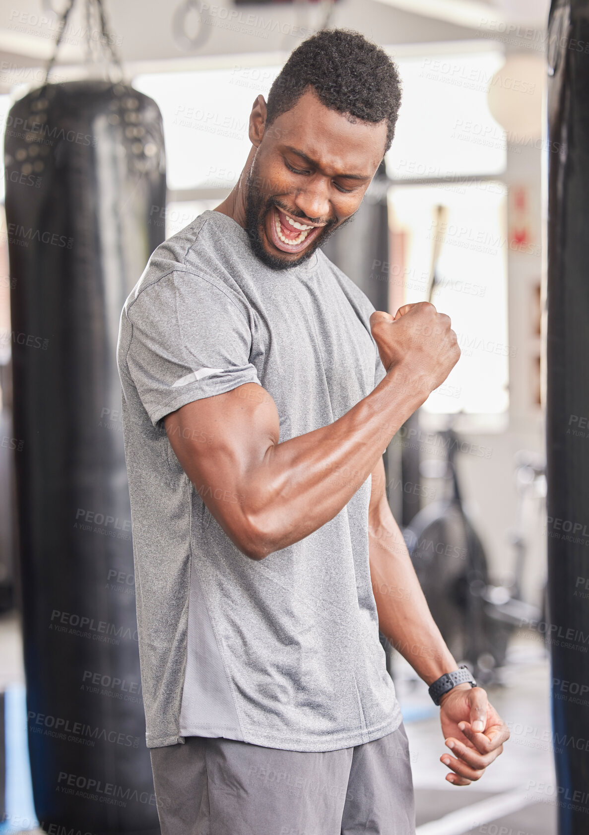 Buy stock photo Fitness, gym and excited black man with muscle after workout, bodybuilder training and boxing exercise. Sports, power and strong male athlete flex biceps for muscular body, goals and achievement