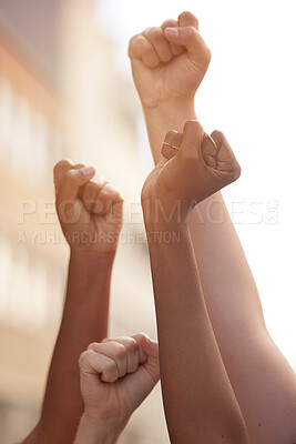 Buy stock photo Hands fist and justice of power by people in protest for freedom, equality and change in a street. Community, action and government rally by man and woman in solidarity for society democracy