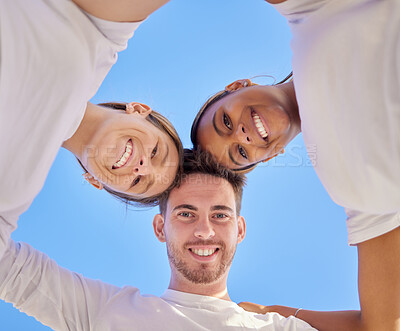 Buy stock photo Diversity, friends and head circle together outdoor for happiness, support huddle and unity collaboration. Interracial friendship group, trust and smile for teamwork solidarity in California blue sky