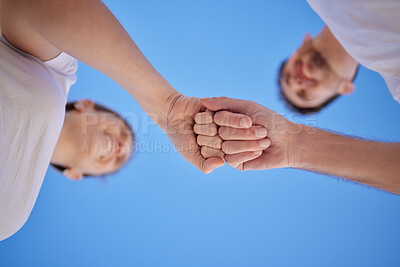 Buy stock photo Happy, teamwork or couple of friends fist bump in celebration of success, marriage goals or solidarity in partnership. Low angle, man and womans hands celebrate goals, mission or commitment support