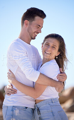 Buy stock photo Portrait, couple love and hug at beach and happy with smile for relationship, romantic date or vacation together. Romance, man and woman with happiness, summer and embrace for travel or holiday