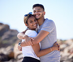 Love, beach and portrait of couple hug enjoying summer vacation, holiday travel and weekend together. Dating, romance and young man and woman hugging, smile and bonding for quality time in nature