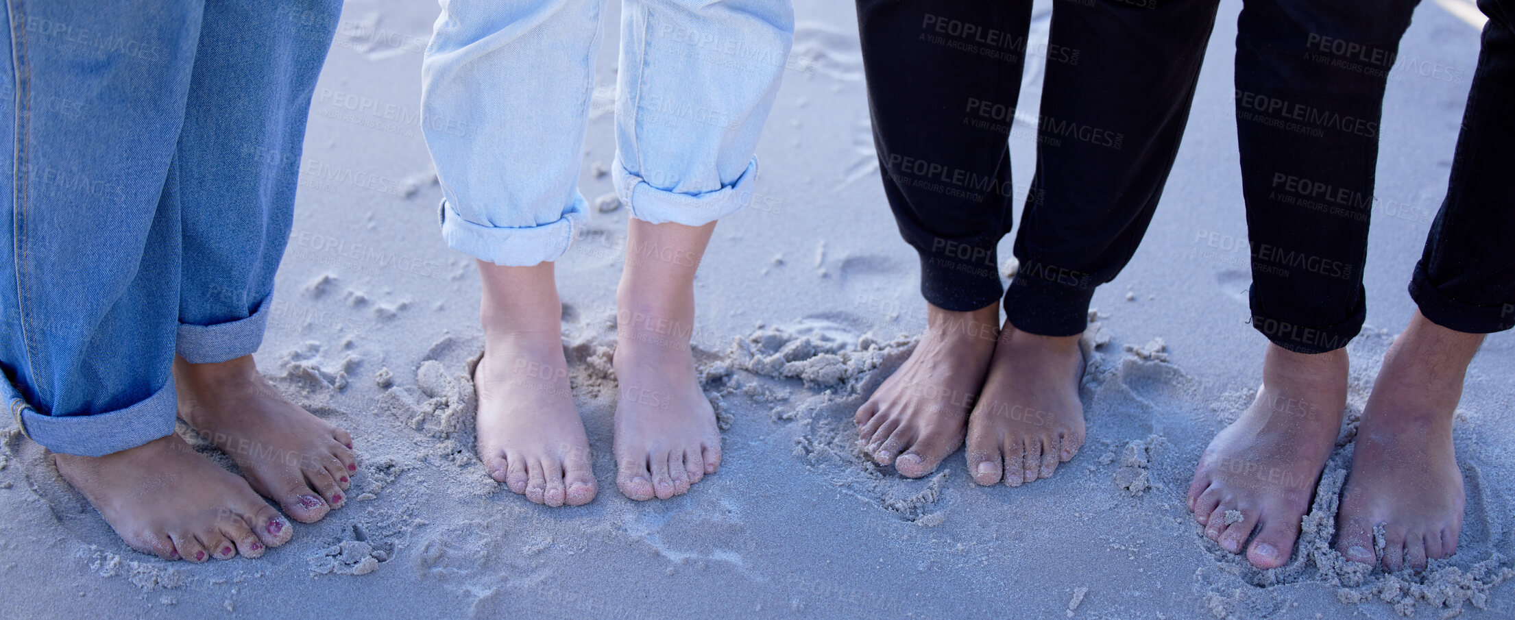 Buy stock photo Beach feet, friends and people on vacation, holiday or summer trip. Toes, freedom and group of men and women standing on sandy seashore, seaside or coast, having fun or enjoying quality time outdoors
