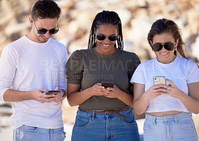 Buy stock photo Friends, group and texting with phone, sunglasses and happy on travel, adventure or holiday in nature. Gen z people, smartphone and social media communication for happiness, vacation and app in Cairo