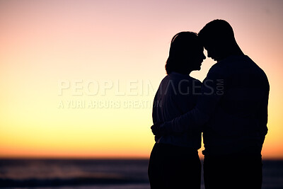 Buy stock photo Couple, silhouette and sunset at beach for love, care and romantic date together with mockup on horizon sky. Shadow of man, woman and people hug at sea for travel, honeymoon vacation and calm holiday