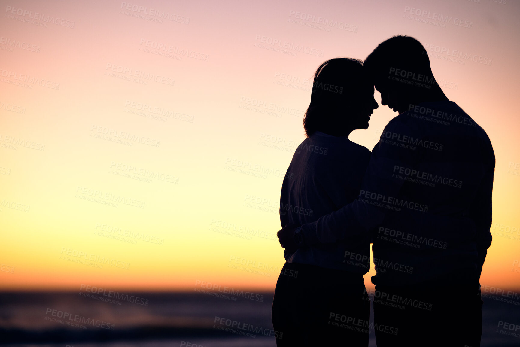 Buy stock photo Couple, silhouette and sunset at beach for love, care and romantic date together with mockup on horizon sky. Shadow of man, woman and people hug at sea for travel, honeymoon vacation and calm holiday