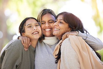 Buy stock photo Women friends, hug and smile in park for happiness, support and relax in sunshine at best friends reunion. Woman group, happy and love embrace with care, nature and blurred background in Los Angeles
