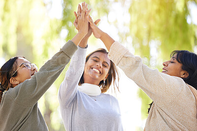 Buy stock photo Friends, park and high five with joy in celebration for love, care and affection in nature. Female group, hands together and joined for bonding friendship with cheerful freedom in carefree garden