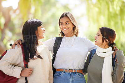 Buy stock photo Nature, friends and students in university garden on campus walking together to class in India. Education, friendship and empowerment, happy women on college scholarship smile with backpack in park.