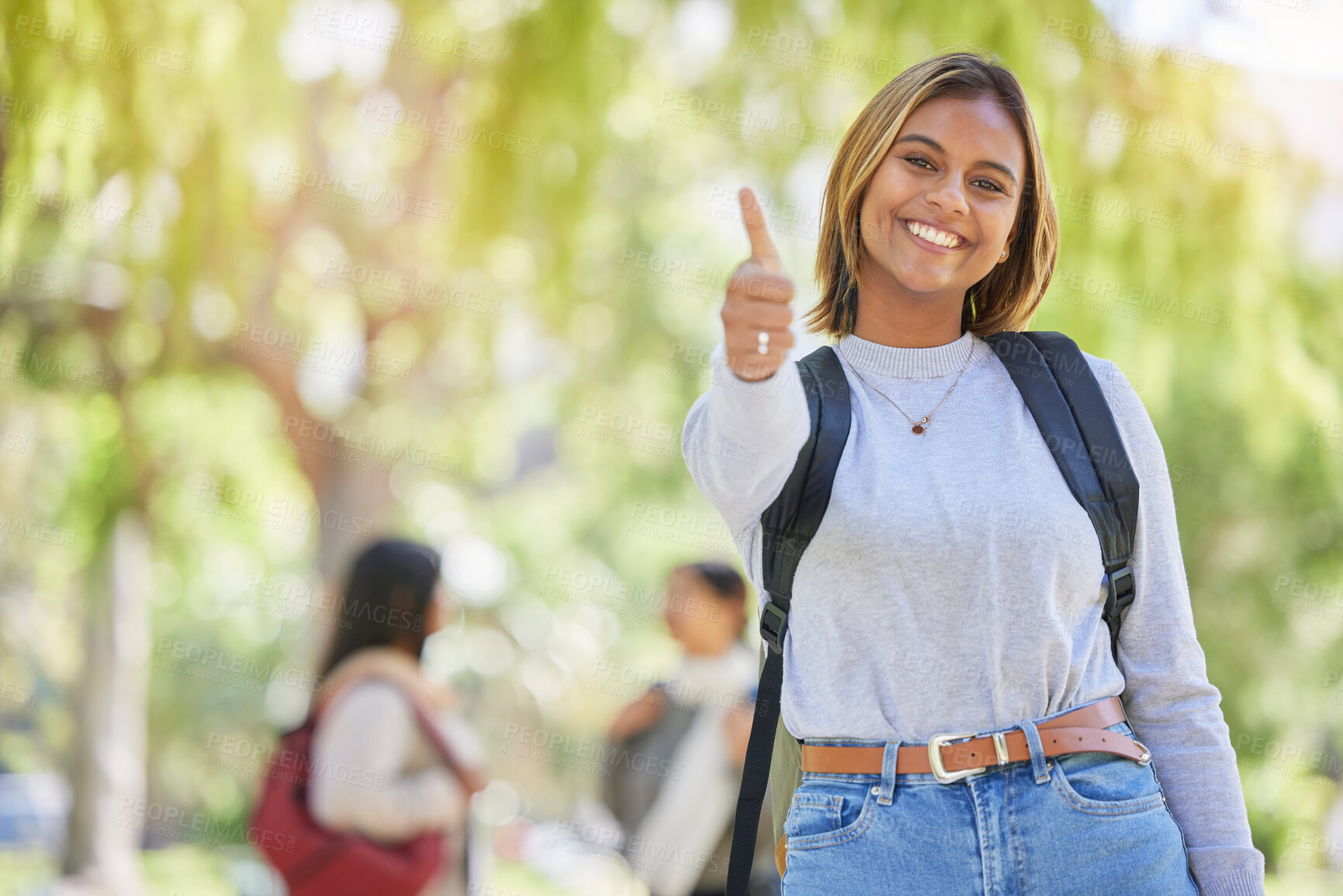 Buy stock photo Thumbs up, university and student or woman in park for scholarship, education and future goals success in a portrait smile. Happy woman on college, school or academy campus with like or yes hand sign
