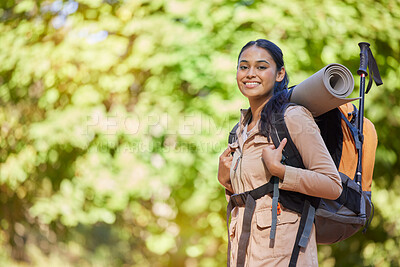 Buy stock photo Hiking, portrait and fit woman backpacking in nature for fitness, strength and adventure. Backpacker, hiker and face of a female sportwoman exploring in a forest for fresh air and trekking peace