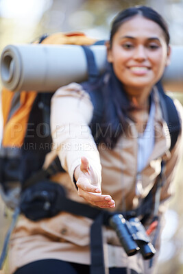Buy stock photo Hiking, helping hands and woman teamwork for travel support, training workout and exercise outdoor. Indian girl, climbing adventure and hiker athlete or sports lifestyle happiness on mountain trail