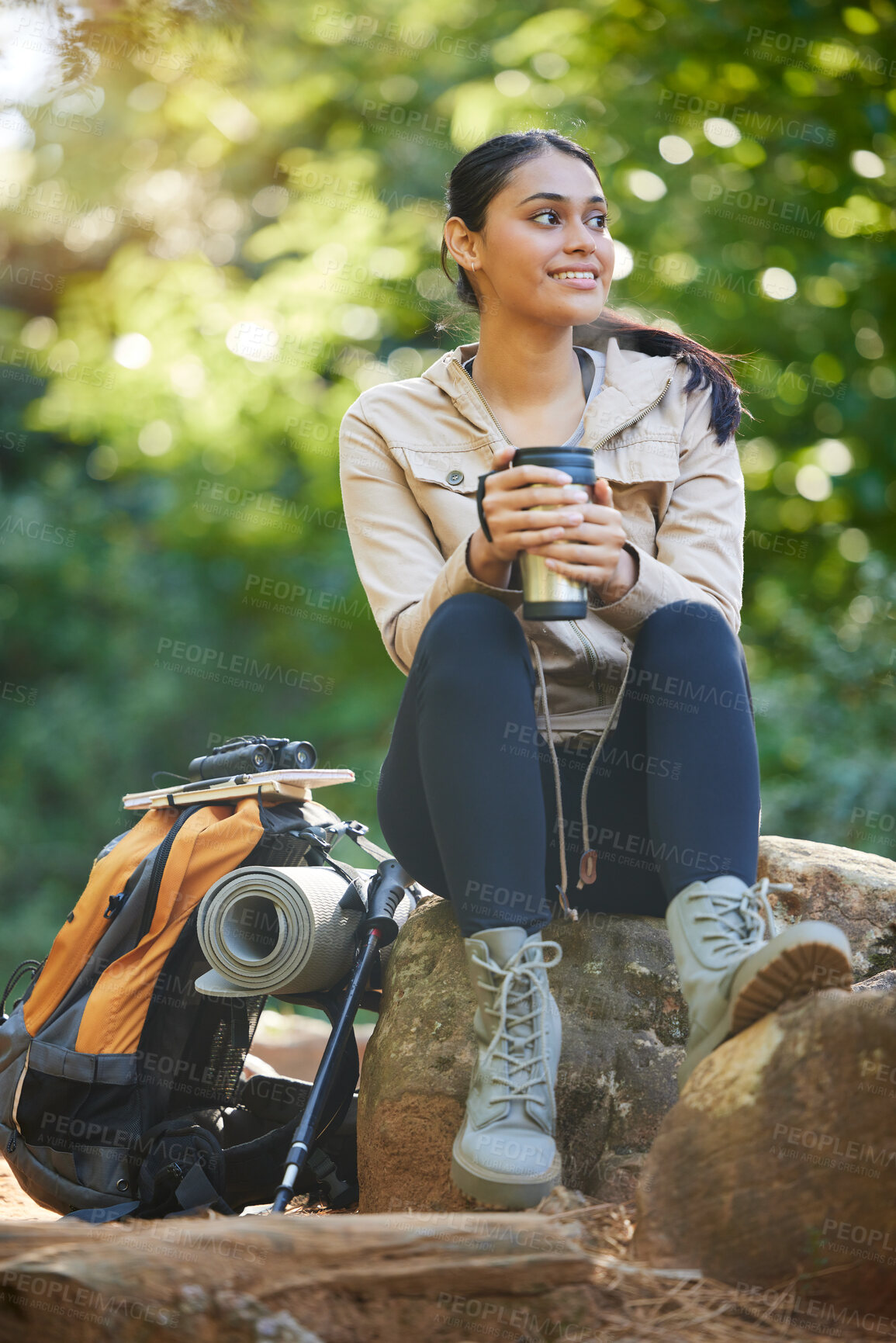 Buy stock photo Hiking, woman and drinking coffee while on a backpacking break in the forest during a hike. Hiker, female and tea drink for freedom and carefree adventure in the woods for sport and active lifestyle