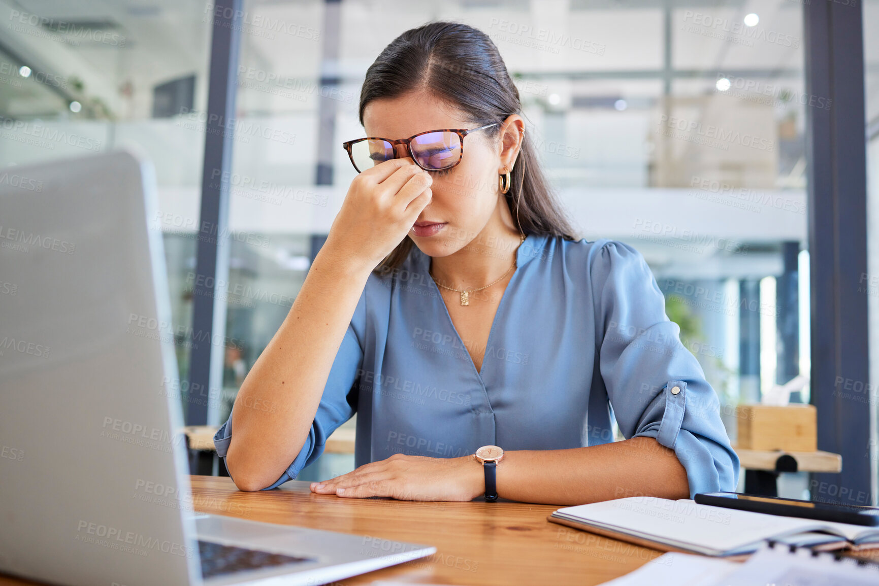 Buy stock photo Stress headache, burnout and woman in office overwhelmed with workload at desk with laptop. Frustrated, overworked and tired woman with computer at startup, anxiety from deadline time pressure crisis