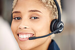 Closeup portrait, call center and agent woman with smile, happiness and headset in customer support. Happy crm, customer service expert or consultant for communication by blurred background in office