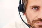 Portrait, call center and man for customer service, 
telemarketing or consulting in office. Male agent, consultant and agent with headset, client support and conversation for help, speaking or advice