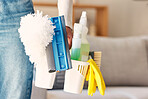 Cleaning, products and hand of cleaner with basket in home preparing for cleaning service. Spring cleaning, hygiene and black woman with cleaning supplies to remove germs, bacteria or dust in house.
