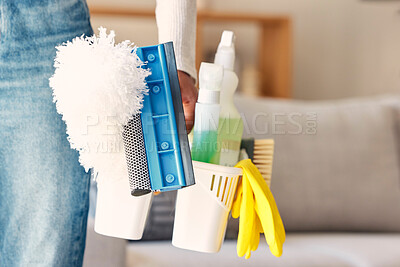 Buy stock photo Cleaning, products and hand of cleaner with basket in home preparing for cleaning service. Spring cleaning, hygiene and black woman with cleaning supplies to remove germs, bacteria or dust in house.