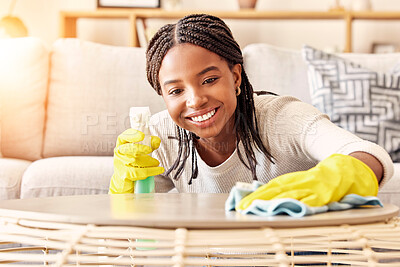 Buy stock photo Smile, spray bottle and black woman cleaning table with gloves and alcohol solution in living room. Coffee table, spring cleaning and happy woman wiping dust in home for safety from bacteria and germ