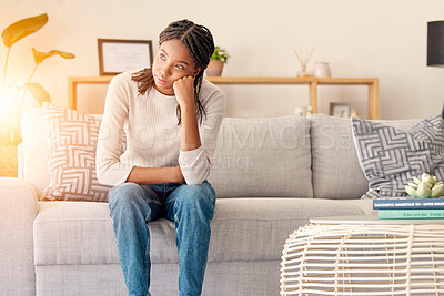 Buy stock photo Stress, thinking or burnout black woman in living room. of house or home with sun lens flare light on sofa. Focus, sunshine or girl sitting on lounge couch with depression, anxiety or mental health
