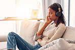 Relax, music and black woman with calm podcast, wellness sound and tired with radio on the sofa. Zen, sleeping and girl with headphones listening to an audio for mindset and peace in the living room