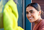 Woman, cleaning and window washing with a smile to clean windows dirt with water, soap and fabric. Happy Indian person cleaner or maid doing spring cleaning with happiness for housekeeping helping