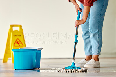 Buy stock photo Cleaning, sign and woman mopping floor in office for hygiene, health and wellness. Spring cleaning, service and janitor, cleaner and female with mop, water bucket and caution wet floor warning notice
