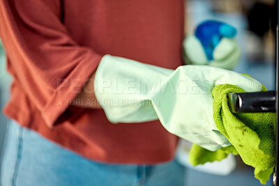Buy stock photo Hand, woman and sanitizing with spring cleaning a door handle surface with a cloth. Busy with routine housework and chores with zoom, hygiene and germ free living space, glove and clean bacteria