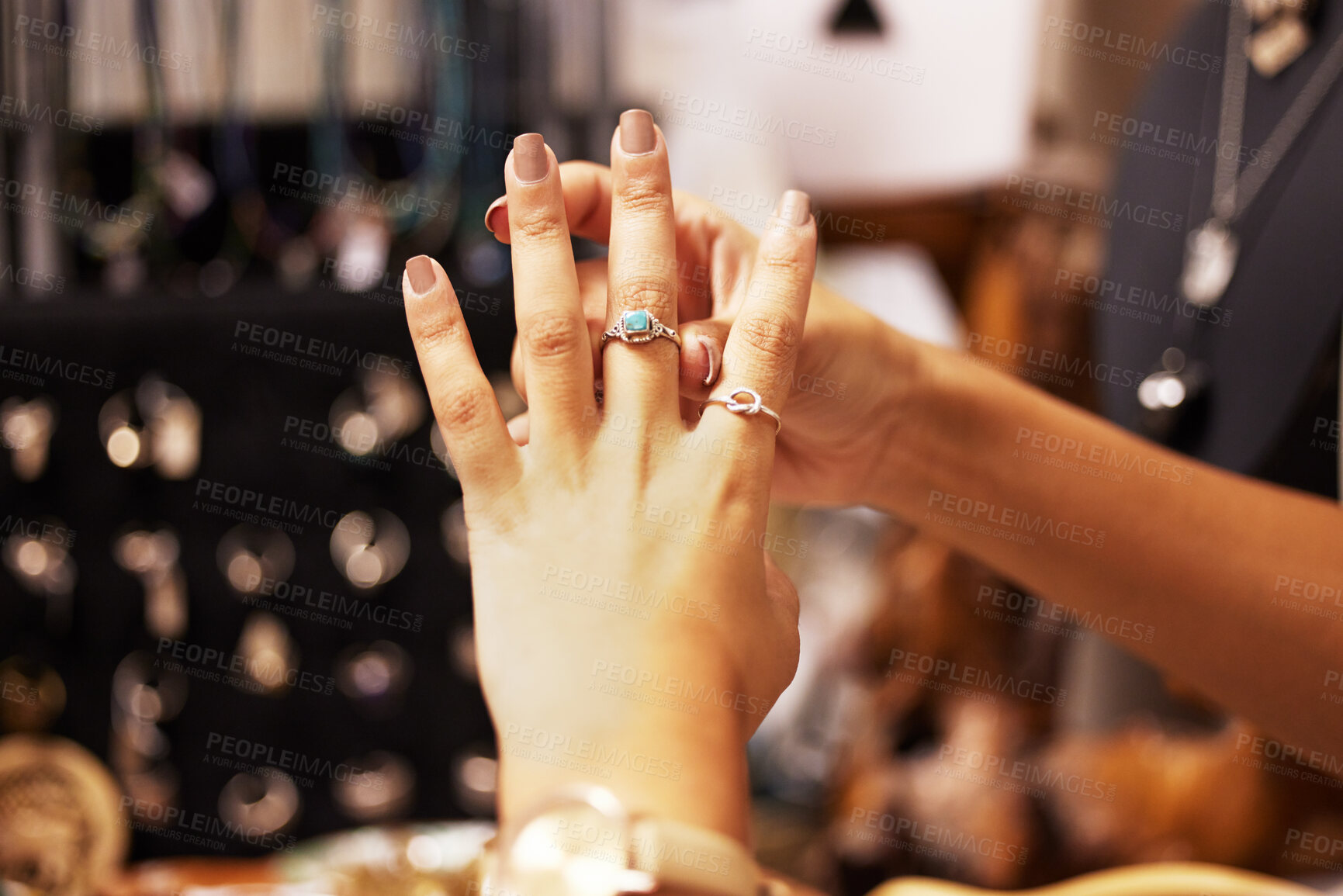 Buy stock photo Jewellery, boutique and hand of woman with ring in shopping mall, retail shop and designer store. Fashion, cosmetics and close up of hands of female customer trying on luxury rings with gemstone