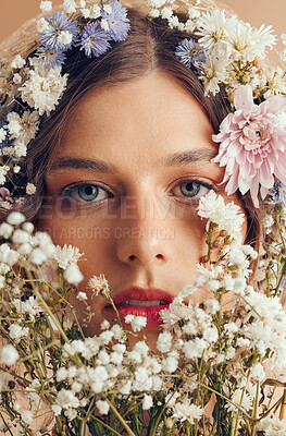 Buy stock photo Woman, beauty portrait and flower crown for natural cosmetic, organic wellness and skincare in spring. Model, face and flowers for glow skin, makeup and floral art for cosmetics by studio background