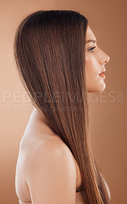 Buy stock photo Woman, beauty and hair care in studio for shine, glow and keratin treatment, texture or color on brown background. Model profile, hair style and cosmetics, beauty salon and shampoo product for growth