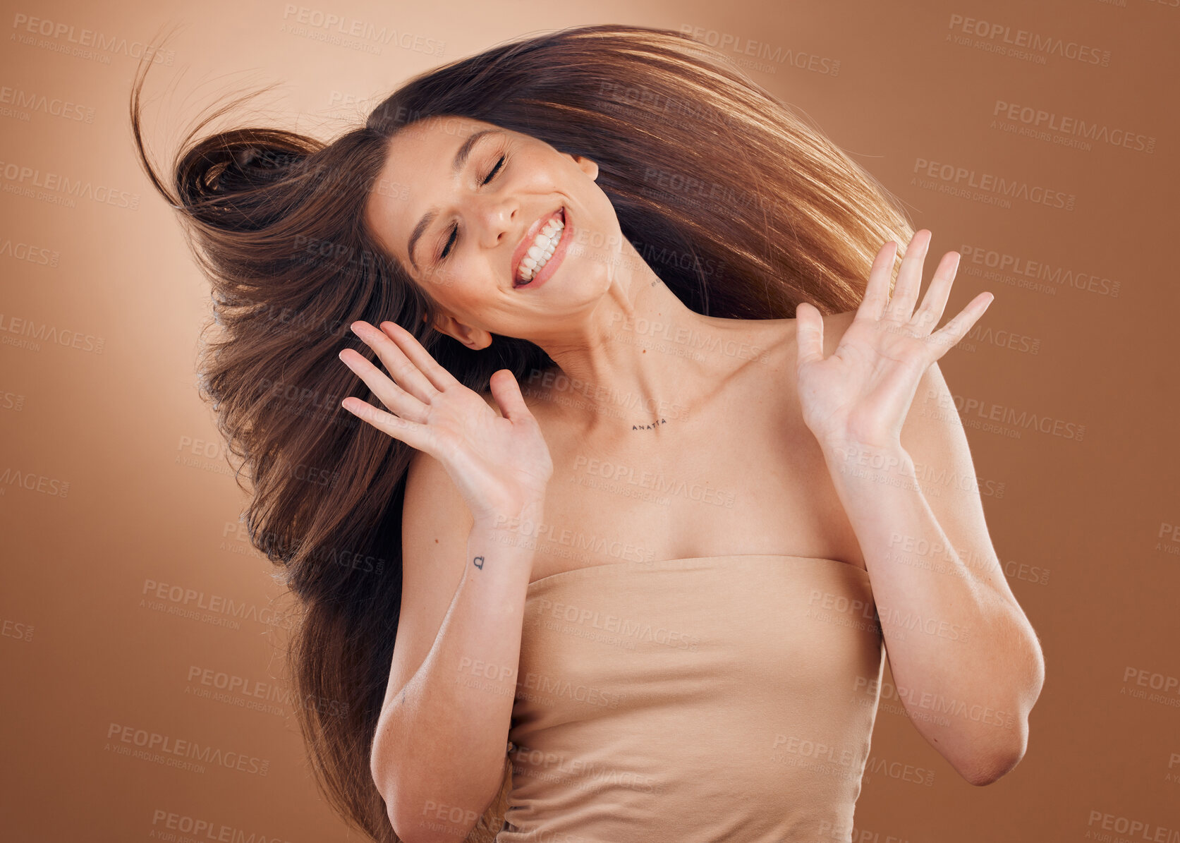 Buy stock photo Woman, hands and hair flip for beauty in studio or hair cosmetics wellness, natural growth and luxury hair care treatment. Model, shampoo dermatology and sknicare glow or salon therapy treatment