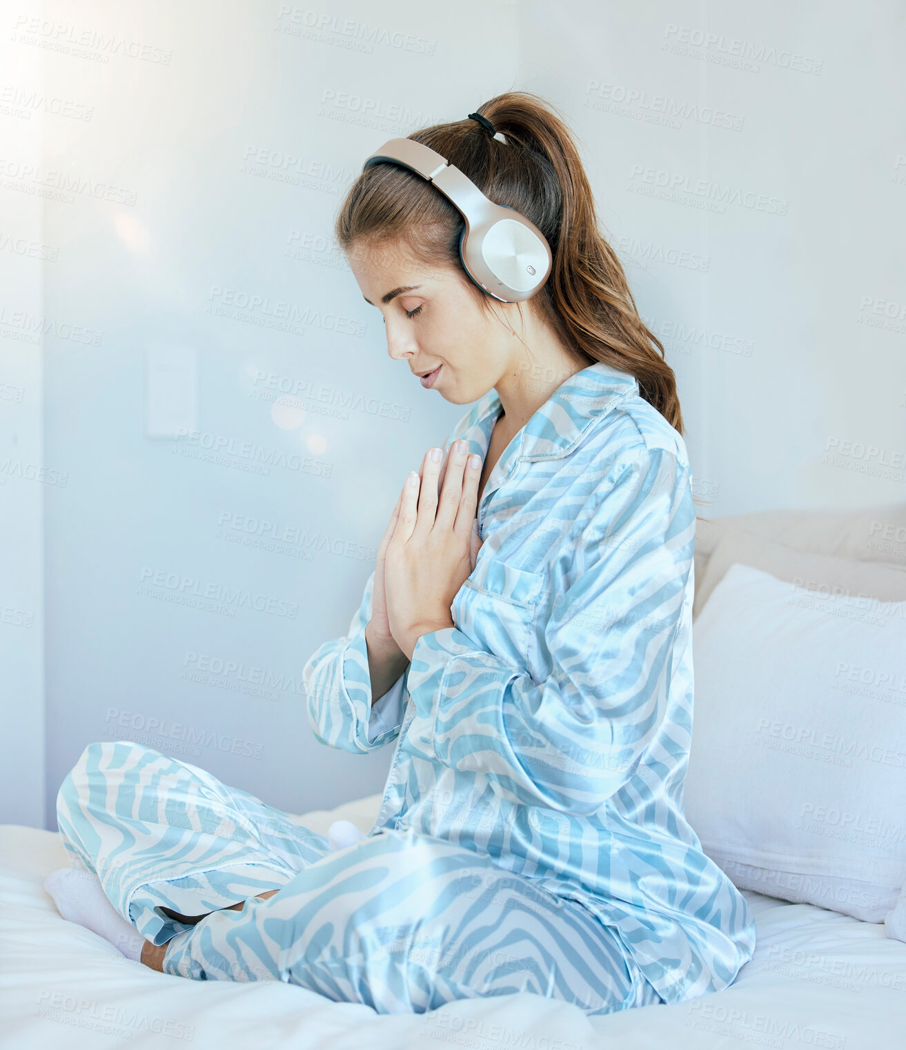 Buy stock photo Woman, music headphones or namaste meditation in house bedroom, home or hotel for mental health, stress management or zen. Calm, peace or yogi listening to relax radio podcast in mind prayer training