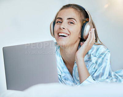 Buy stock photo Woman, student and headphones with laptop for music, streaming and learning online with happiness, education podcast and technology. Academic audio, listening portrait and sound, radio and relax.